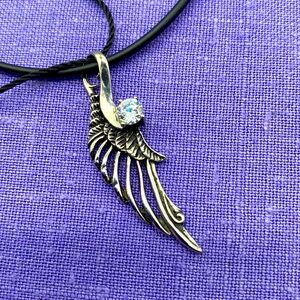 Gorgeous silver tone stainless steel angel wing pendant with black cord 🌸